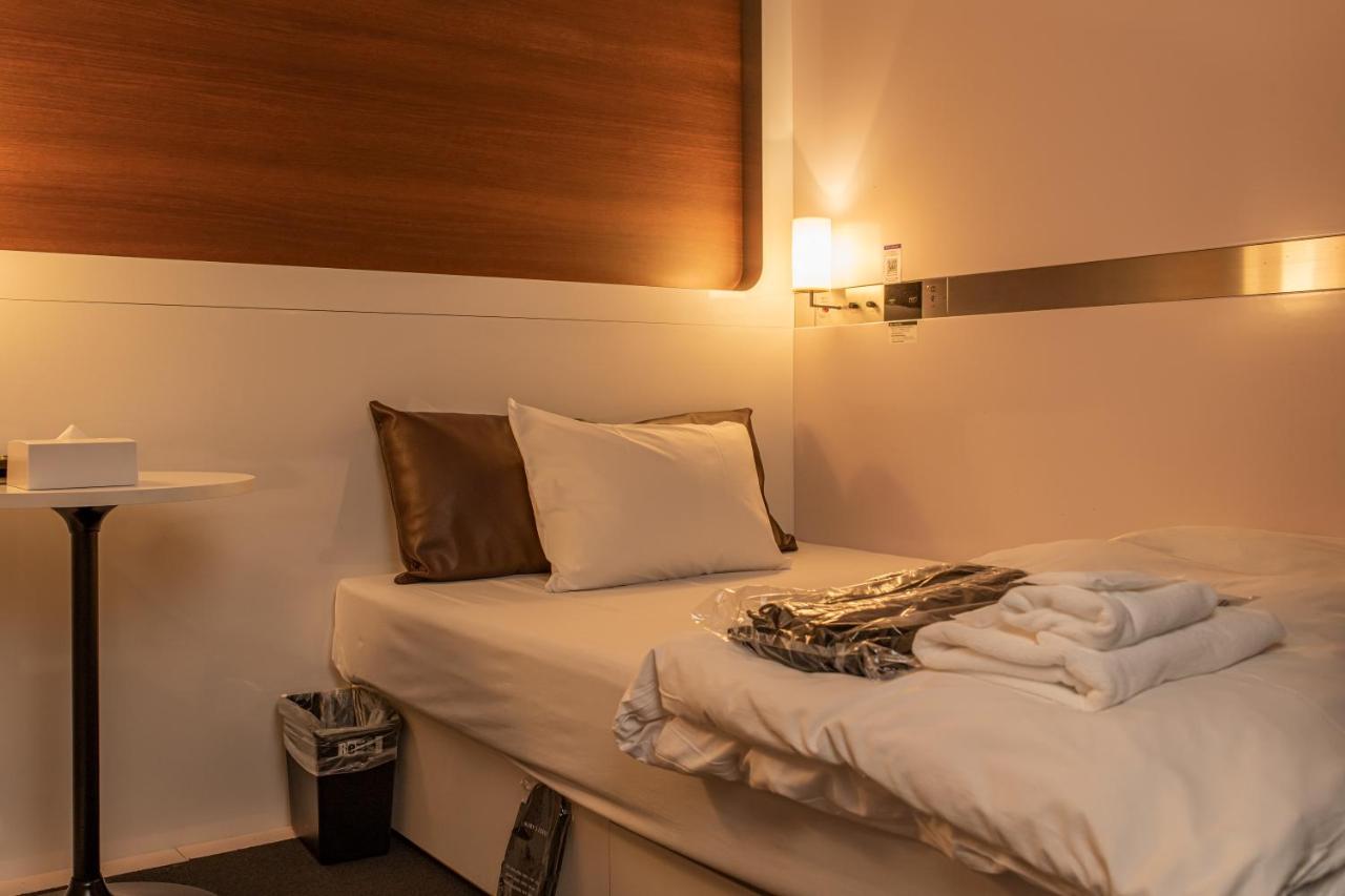 Capsule Hotel -  Male photo